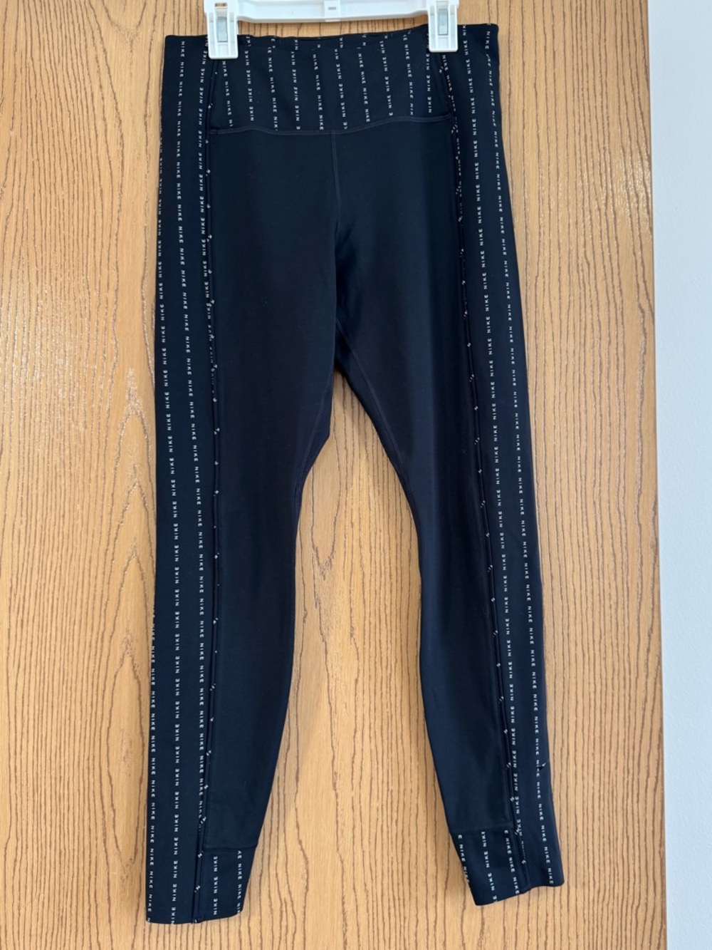 Nike women’s Black Leggings with White Side Dot Stripe